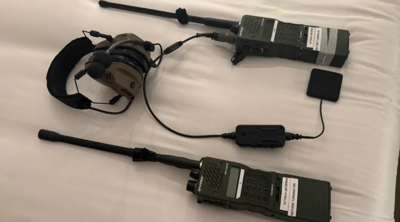 Ixana's military gear. Wi-R signals stay within personal radius for max security.